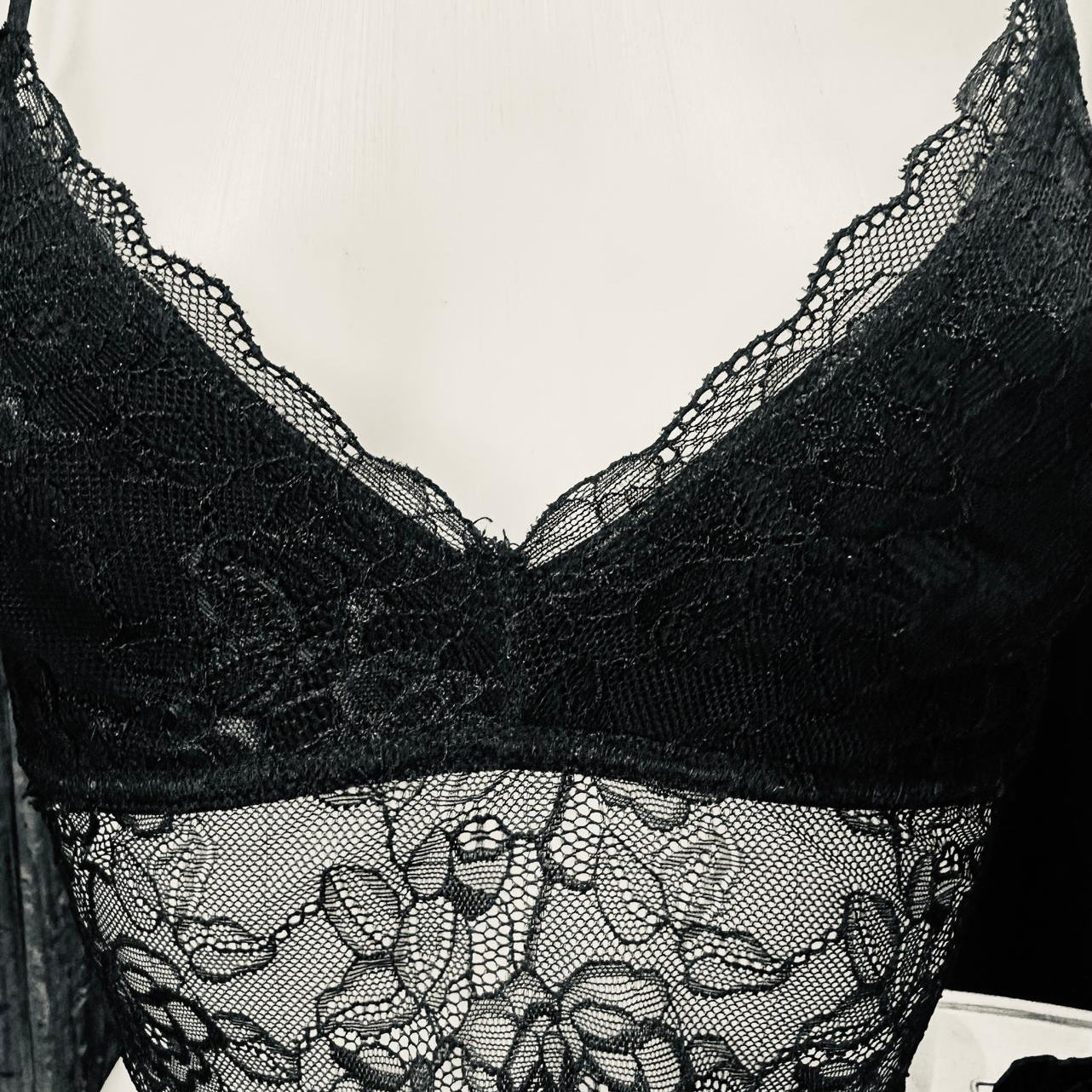 Black lace bra on a white background