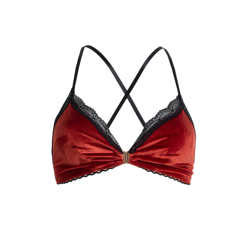 orange velvet bra with black lace trim on a white background