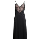 Black slip dress with lace detailing on a white background